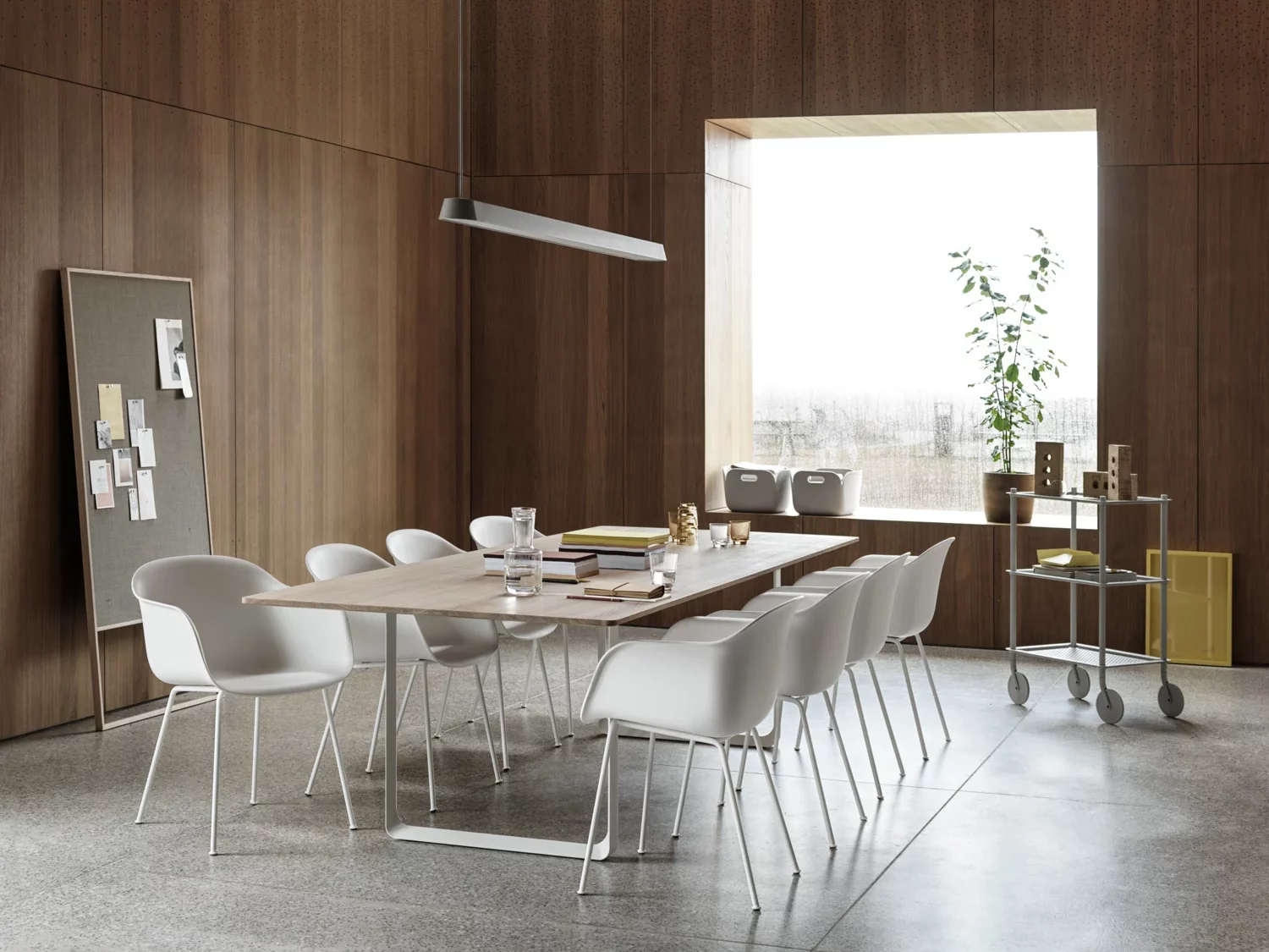 en fiber armchair white tube solid oak white x linear pendant grey flow trolley raise muuto org v edited Conference room with long wooden table surrounded by white chairs.