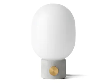 JWDA Concrete Table Lamp with a grey cylindrical base, gold dimmer dial and rounded white shade